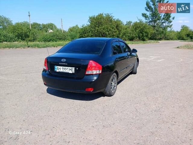 Черный Киа Черато, объемом двигателя 1.6 л и пробегом 225 тыс. км за 5200 $, фото 3 на Automoto.ua