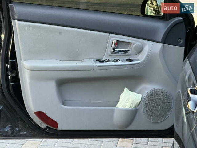 Черный Киа Черато, объемом двигателя 1.98 л и пробегом 180 тыс. км за 5750 $, фото 22 на Automoto.ua