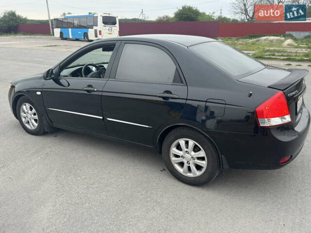 Черный Киа Черато, объемом двигателя 1.6 л и пробегом 244 тыс. км за 4450 $, фото 6 на Automoto.ua