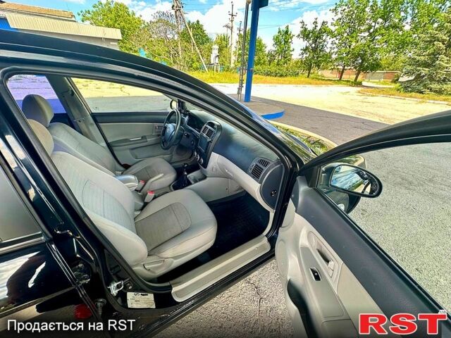 Киа Черато 2008 в Кропивницком (Кировограде) на Automoto.ua Черный Киа Черато, объемом двигателя 1.6 л и пробегом 259 тыс. км за 4850 $, фото 7 на Automoto.ua