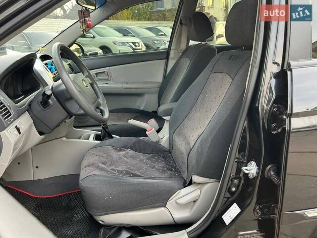 Чорний Кіа Черато, об'ємом двигуна 1.59 л та пробігом 76 тис. км за 5690 $, фото 8 на Automoto.ua