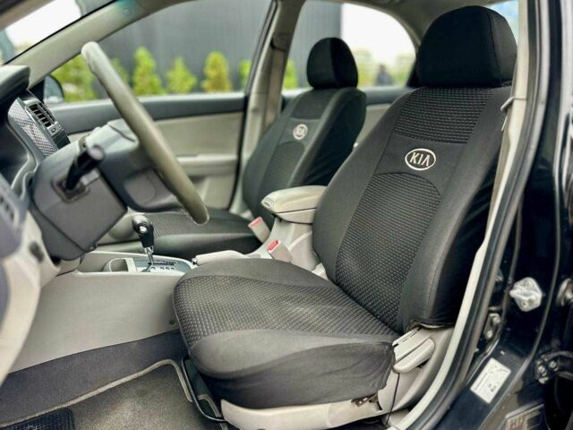 Чорний Кіа Черато, об'ємом двигуна 2 л та пробігом 270 тис. км за 4000 $, фото 10 на Automoto.ua