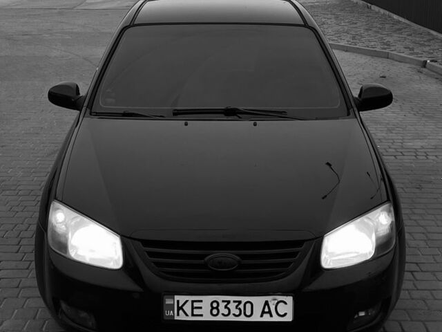 Чорний Кіа Черато, об'ємом двигуна 1.6 л та пробігом 300 тис. км за 4700 $, фото 11 на Automoto.ua