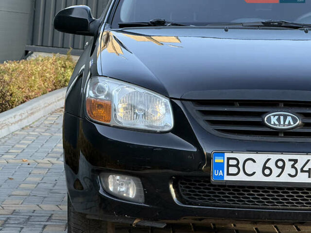Черный Киа Черато, объемом двигателя 1.98 л и пробегом 180 тыс. км за 5750 $, фото 2 на Automoto.ua