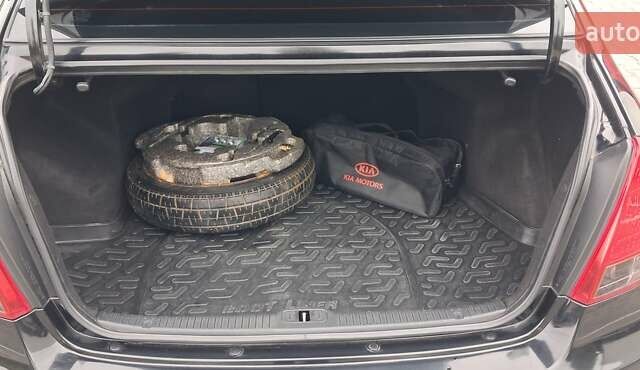 Кіа Черато 2008 у Кременчуге на Automoto.ua Чорний Кіа Черато, об'ємом двигуна 2 л та пробігом 193 тис. км за 5300 $, фото 14 на Automoto.ua