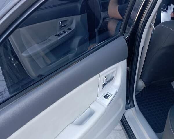 Черный Киа Черато, объемом двигателя 1.59 л и пробегом 166 тыс. км за 4600 $, фото 14 на Automoto.ua