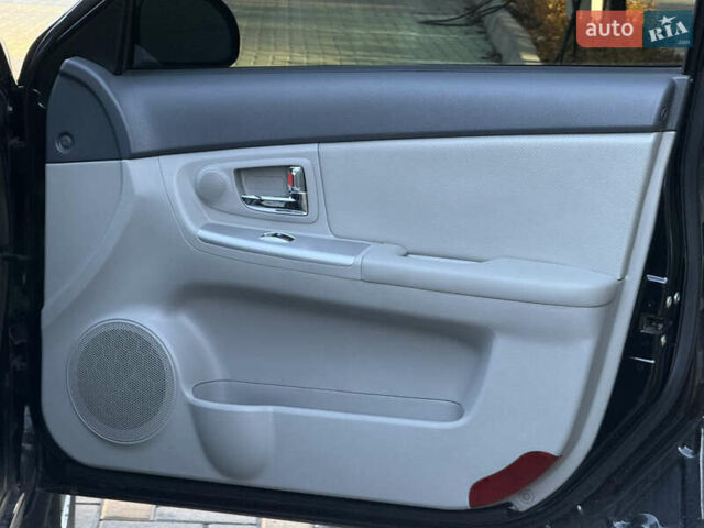 Черный Киа Черато, объемом двигателя 1.98 л и пробегом 180 тыс. км за 5750 $, фото 20 на Automoto.ua