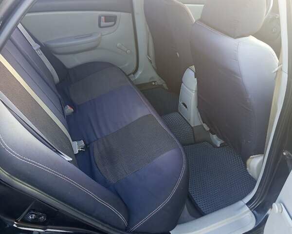 Чорний Кіа Черато, об'ємом двигуна 1.6 л та пробігом 232 тис. км за 4250 $, фото 15 на Automoto.ua