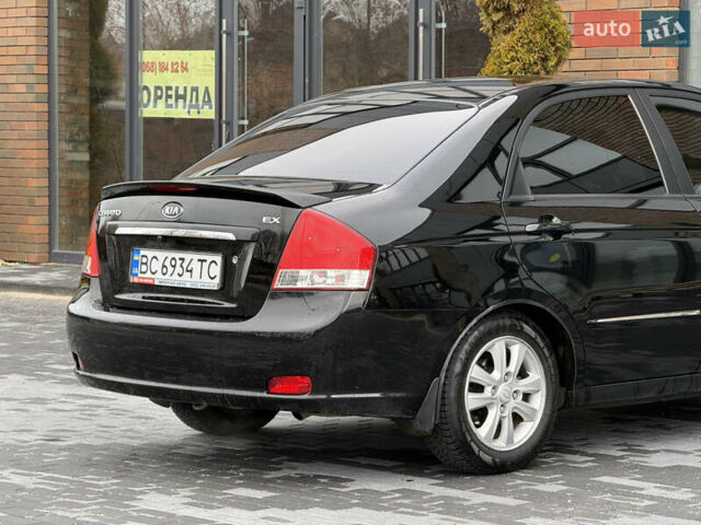 Черный Киа Черато, объемом двигателя 1.98 л и пробегом 180 тыс. км за 5500 $, фото 16 на Automoto.ua