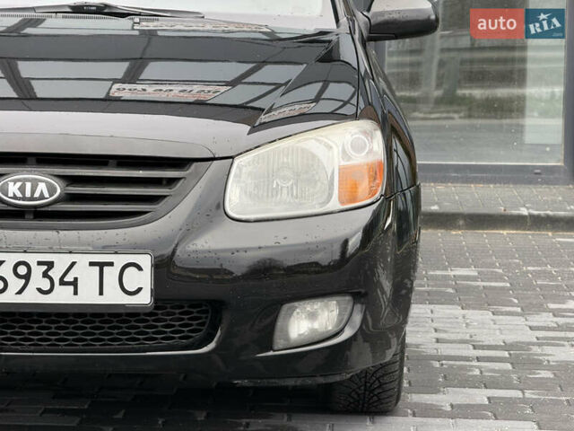 Черный Киа Черато, объемом двигателя 1.98 л и пробегом 180 тыс. км за 5500 $, фото 4 на Automoto.ua