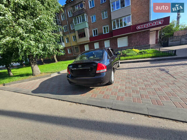 Черный Киа Черато, объемом двигателя 1.6 л и пробегом 232 тыс. км за 4000 $, фото 2 на Automoto.ua