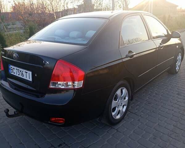 Чорний Кіа Черато, об'ємом двигуна 1.6 л та пробігом 232 тис. км за 4250 $, фото 9 на Automoto.ua