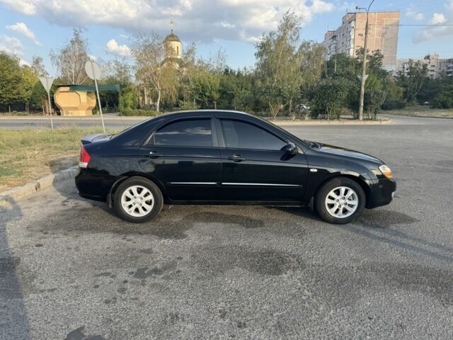 Черный Киа Черато, объемом двигателя 1.6 л и пробегом 156 тыс. км за 5500 $, фото 2 на Automoto.ua