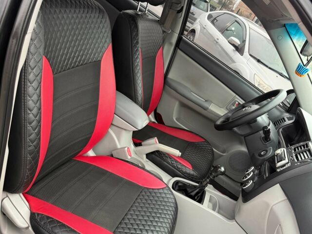 Черный Киа Черато, объемом двигателя 1.6 л и пробегом 258 тыс. км за 5200 $, фото 6 на Automoto.ua