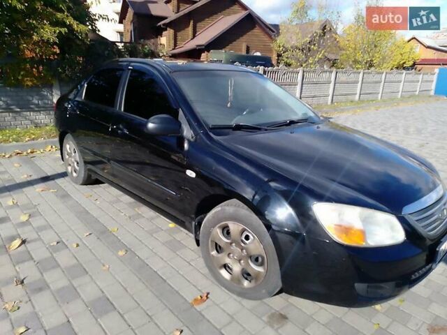 Чорний Кіа Черато, об'ємом двигуна 1.6 л та пробігом 335 тис. км за 5500 $, фото 3 на Automoto.ua
