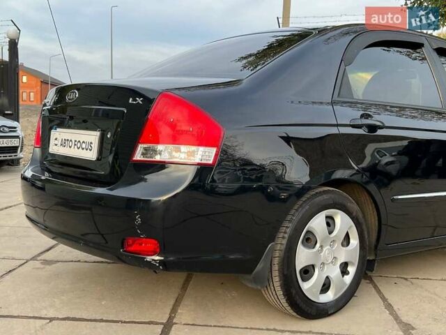 Чорний Кіа Черато, об'ємом двигуна 1.59 л та пробігом 75 тис. км за 6690 $, фото 7 на Automoto.ua