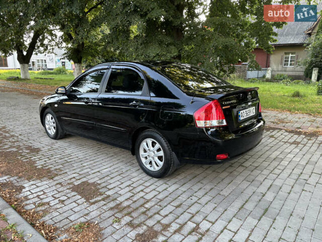 Черный Киа Черато, объемом двигателя 1.98 л и пробегом 264 тыс. км за 5700 $, фото 6 на Automoto.ua