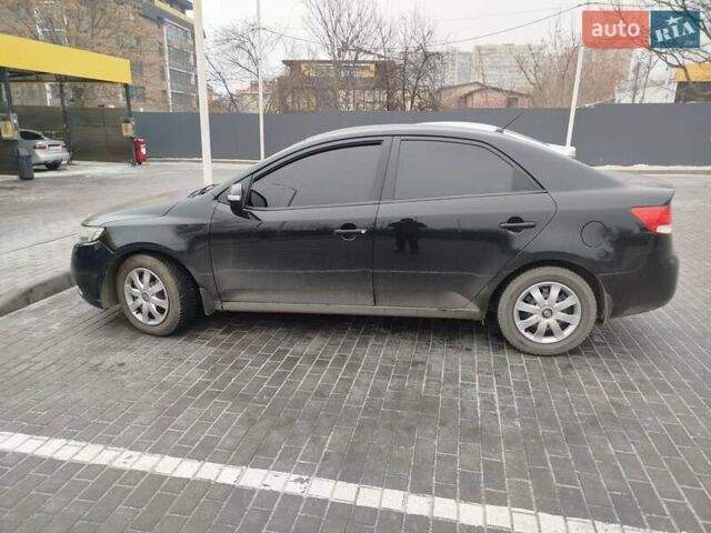 Черный Киа Черато, объемом двигателя 2 л и пробегом 162 тыс. км за 6650 $, фото 4 на Automoto.ua