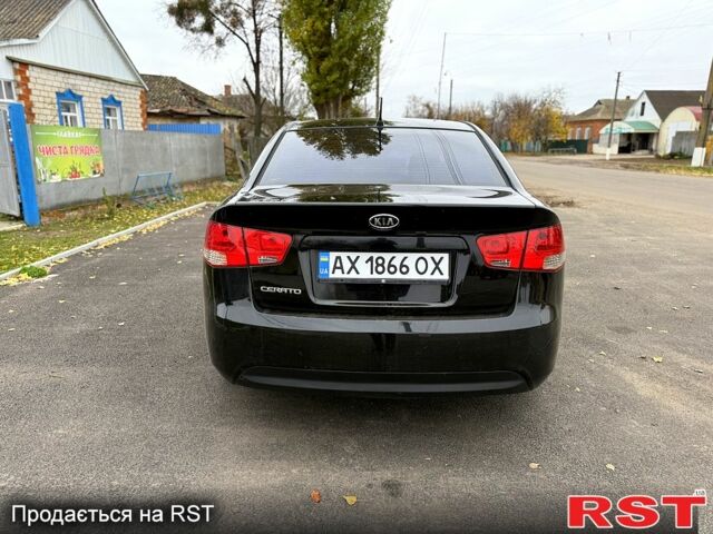 Черный Киа Черато, объемом двигателя 1.6 л и пробегом 200 тыс. км за 5650 $, фото 4 на Automoto.ua