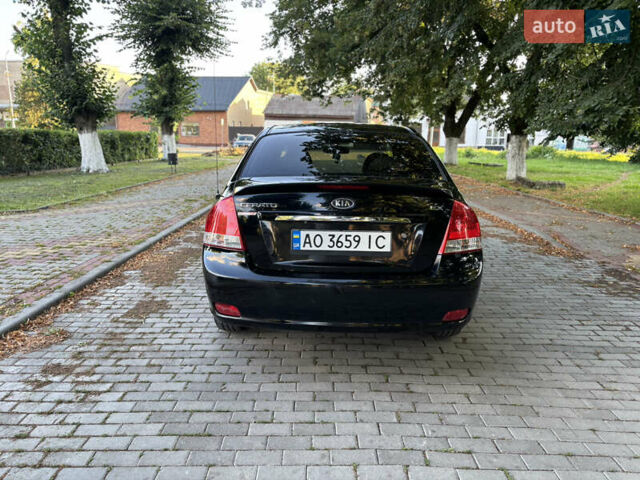 Черный Киа Черато, объемом двигателя 1.98 л и пробегом 264 тыс. км за 5700 $, фото 7 на Automoto.ua
