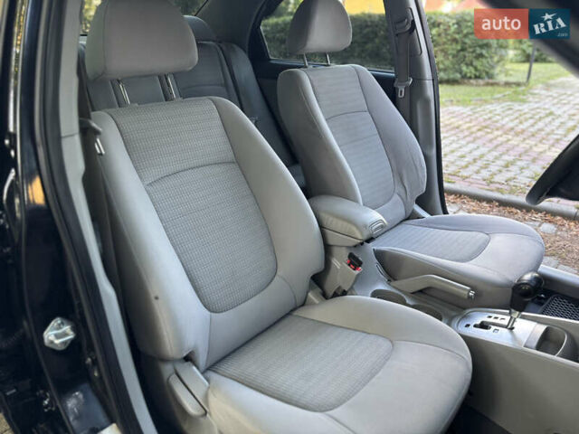 Черный Киа Черато, объемом двигателя 1.98 л и пробегом 264 тыс. км за 5700 $, фото 32 на Automoto.ua