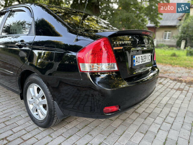 Черный Киа Черато, объемом двигателя 1.98 л и пробегом 264 тыс. км за 5700 $, фото 15 на Automoto.ua