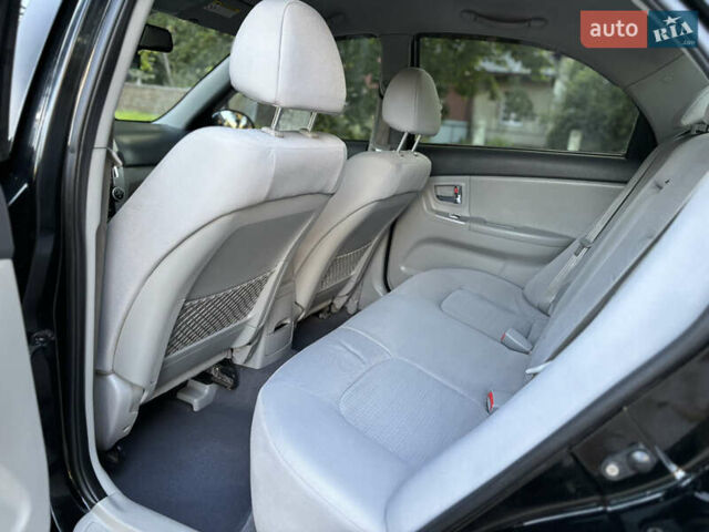 Черный Киа Черато, объемом двигателя 1.98 л и пробегом 264 тыс. км за 5700 $, фото 45 на Automoto.ua
