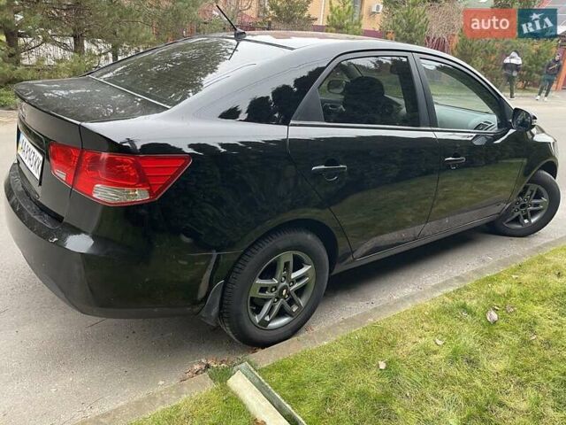 Чорний Кіа Черато, об'ємом двигуна 1.59 л та пробігом 203 тис. км за 6100 $, фото 6 на Automoto.ua