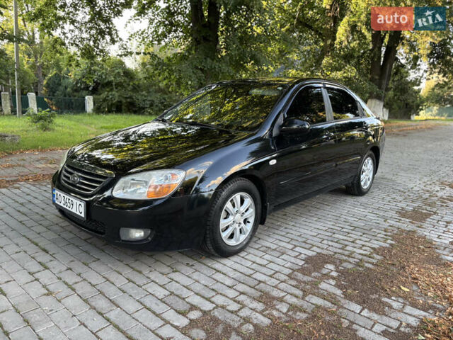 Черный Киа Черато, объемом двигателя 1.98 л и пробегом 264 тыс. км за 5700 $, фото 4 на Automoto.ua