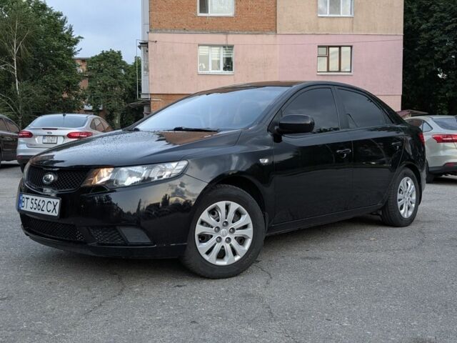 Чорний Кіа Черато, об'ємом двигуна 1.6 л та пробігом 179 тис. км за 6800 $, фото 1 на Automoto.ua