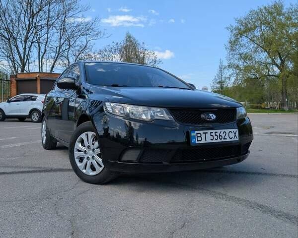 Чорний Кіа Черато, об'ємом двигуна 1.6 л та пробігом 175 тис. км за 7300 $, фото 2 на Automoto.ua