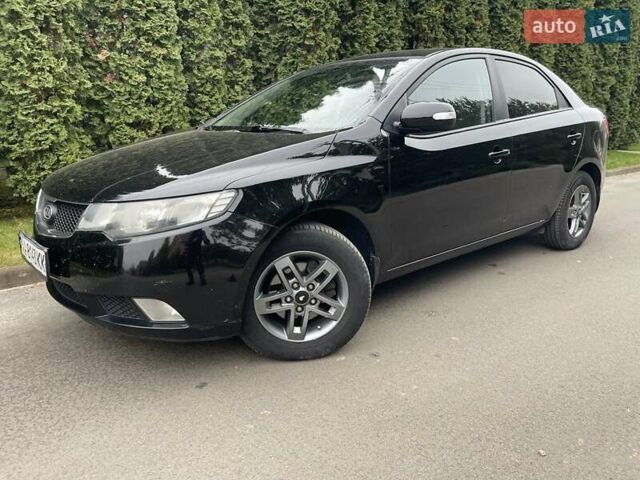 Чорний Кіа Черато, об'ємом двигуна 1.59 л та пробігом 203 тис. км за 6100 $, фото 1 на Automoto.ua