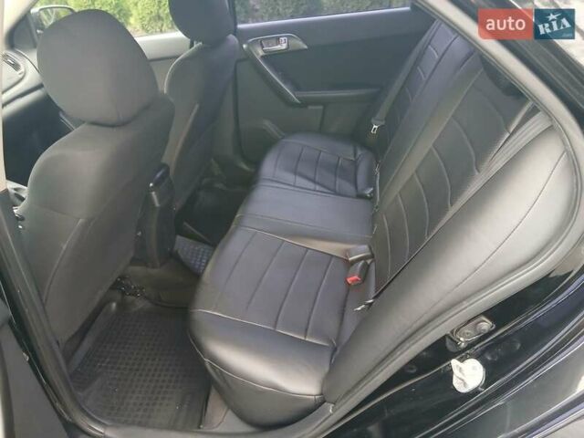 Черный Киа Черато, объемом двигателя 1.6 л и пробегом 253 тыс. км за 5300 $, фото 15 на Automoto.ua