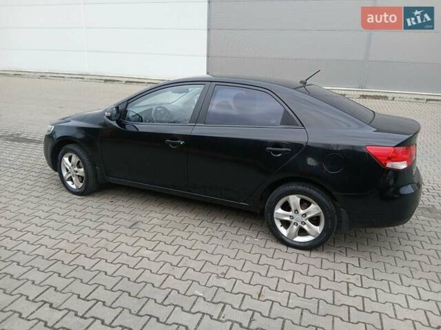 Черный Киа Черато, объемом двигателя 1.59 л и пробегом 253 тыс. км за 5300 $, фото 6 на Automoto.ua