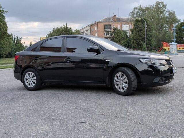 Чорний Кіа Черато, об'ємом двигуна 1.6 л та пробігом 179 тис. км за 6800 $, фото 2 на Automoto.ua