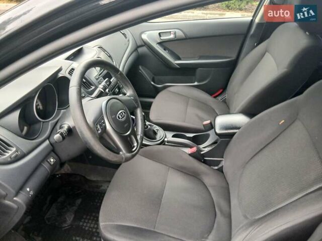 Черный Киа Черато, объемом двигателя 1.6 л и пробегом 253 тыс. км за 5300 $, фото 13 на Automoto.ua