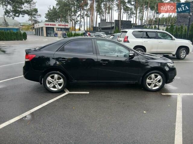 Черный Киа Черато, объемом двигателя 1.6 л и пробегом 253 тыс. км за 5300 $, фото 6 на Automoto.ua