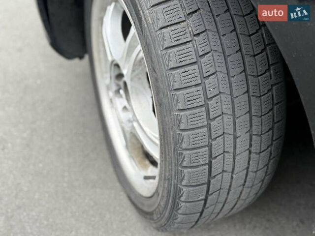 Черный Киа Черато, объемом двигателя 1.59 л и пробегом 182 тыс. км за 5200 $, фото 7 на Automoto.ua
