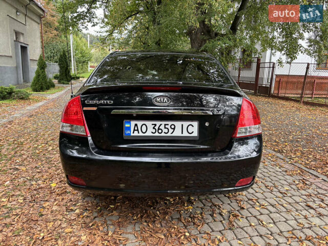 Черный Киа Черато, объемом двигателя 1.98 л и пробегом 264 тыс. км за 5800 $, фото 9 на Automoto.ua