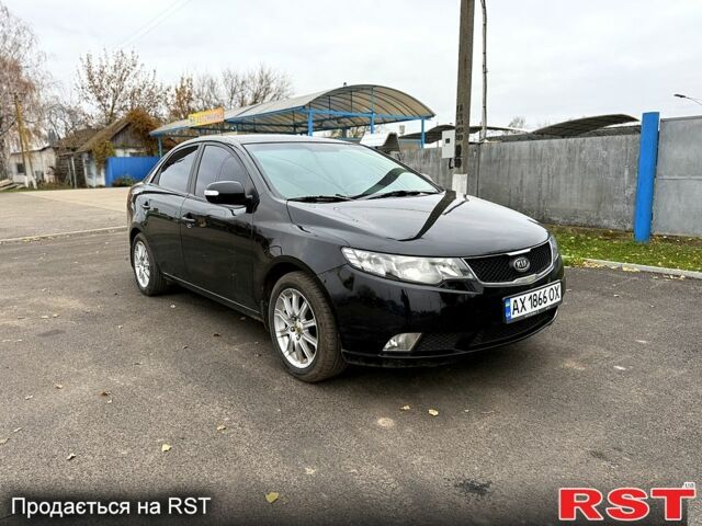 Черный Киа Черато, объемом двигателя 1.6 л и пробегом 200 тыс. км за 5650 $, фото 2 на Automoto.ua
