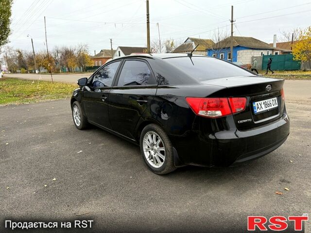 Черный Киа Черато, объемом двигателя 1.6 л и пробегом 200 тыс. км за 5650 $, фото 5 на Automoto.ua