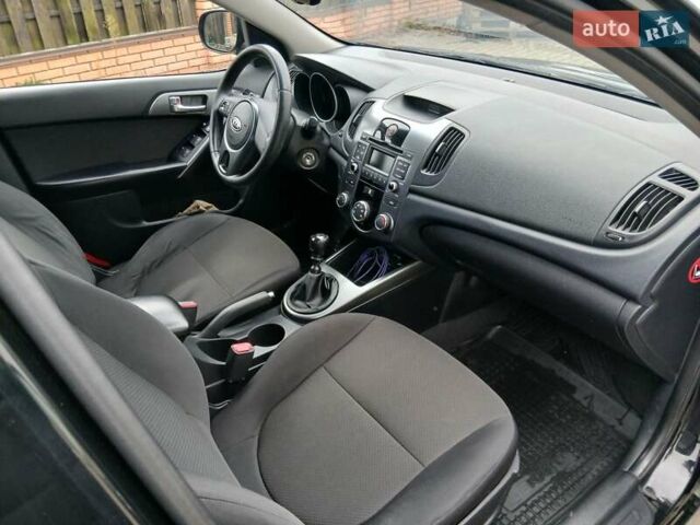 Черный Киа Черато, объемом двигателя 1.59 л и пробегом 253 тыс. км за 5300 $, фото 24 на Automoto.ua