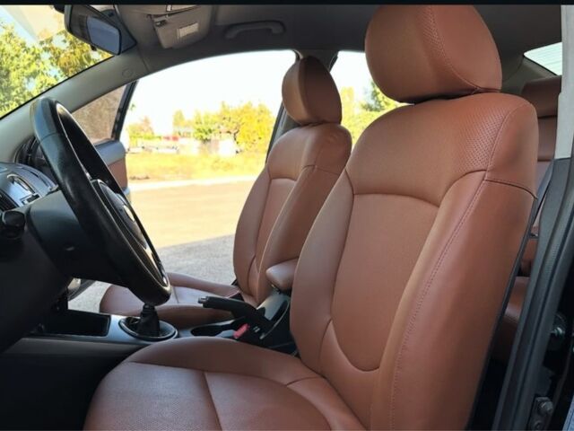 Чорний Кіа Черато, об'ємом двигуна 2 л та пробігом 170 тис. км за 5700 $, фото 2 на Automoto.ua