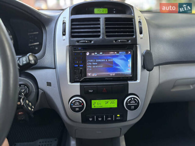 Черный Киа Черато, объемом двигателя 1.98 л и пробегом 264 тыс. км за 5700 $, фото 54 на Automoto.ua