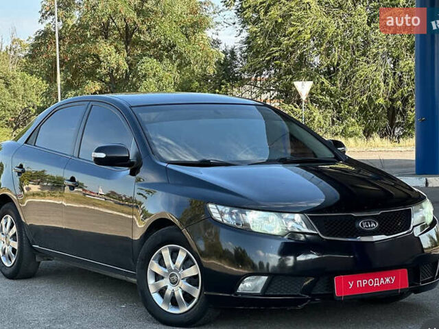 Киа Черато 2009 в Днепре (Днепропетровске) на Automoto.ua Черный Киа Черато, объемом двигателя 2 л и пробегом 162 тыс. км за 5700 $, фото 6 на Automoto.ua