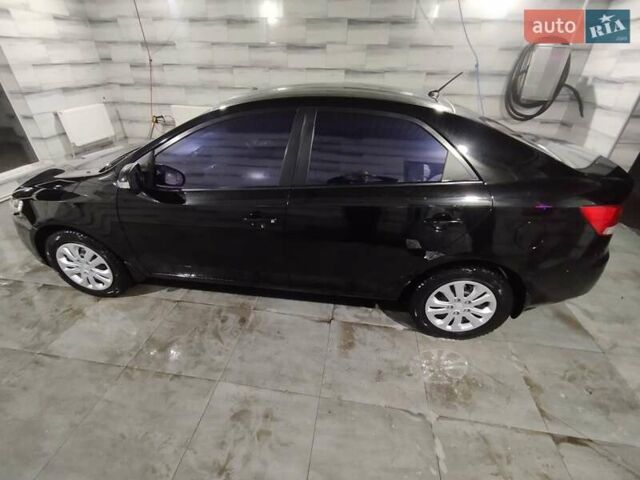 Черный Киа Черато, объемом двигателя 1.59 л и пробегом 180 тыс. км за 6800 $, фото 6 на Automoto.ua