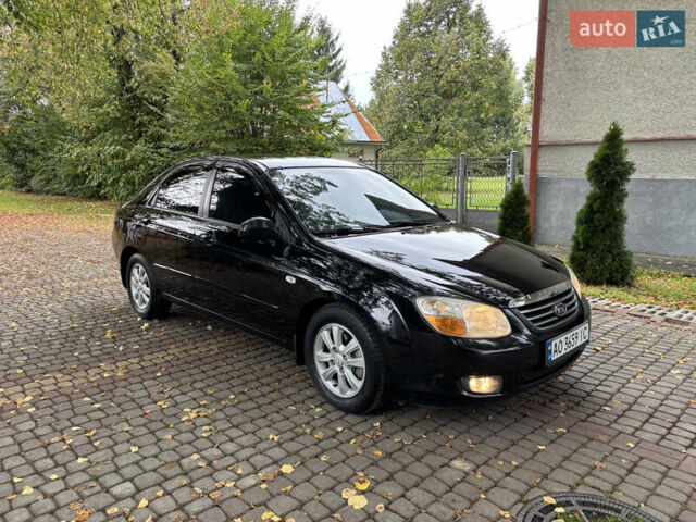 Черный Киа Черато, объемом двигателя 1.98 л и пробегом 265 тыс. км за 5450 $, фото 7 на Automoto.ua