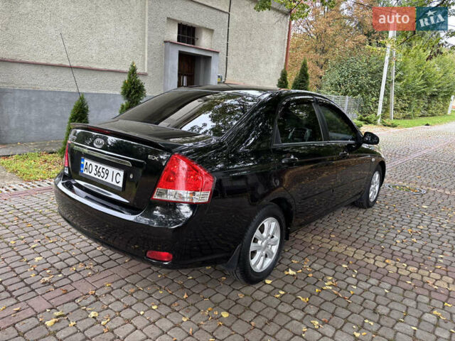 Черный Киа Черато, объемом двигателя 1.98 л и пробегом 265 тыс. км за 5450 $, фото 5 на Automoto.ua