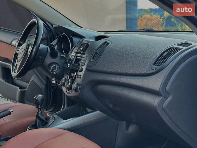 Киа Черато 2009 в Днепре (Днепропетровске) на Automoto.ua Черный Киа Черато, объемом двигателя 2 л и пробегом 162 тыс. км за 5700 $, фото 11 на Automoto.ua