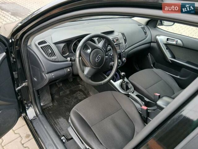 Черный Киа Черато, объемом двигателя 1.59 л и пробегом 253 тыс. км за 5300 $, фото 16 на Automoto.ua